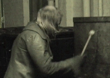 Dim working the trash can