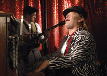 Christoph Franken as Fat Melon Willie McClinton