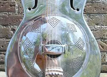 Arjans shining tin guitar